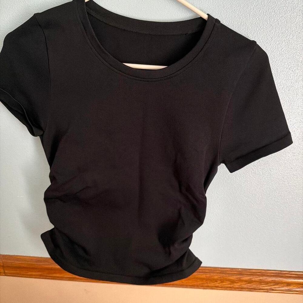 OQQ size medium medium black top with ruched sides